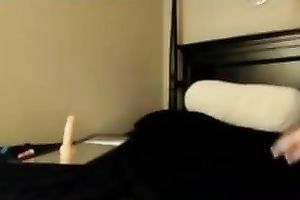 Long-haired web camera floozy shows her holes and plays with a sextoy