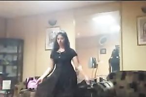 Amateur dark brown disrobes down to her underware in homemade solo movie