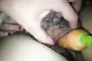Stuffing a carrot in my curly BBW snapper on closeup home movie