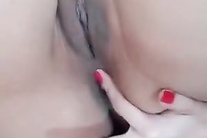 Naughty Asian slutwife demonstrates her hairless bawdy cleft for the camera