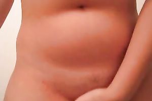 Cute honey with large tits shows her cameltoe on the movie scene