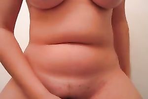 Cute honey with large tits shows her cameltoe on the movie scene