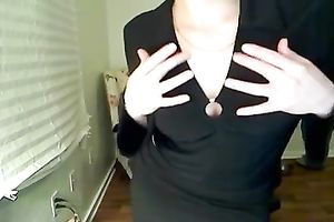 This hot redhead cutie still has no gutts to disrobe on cam