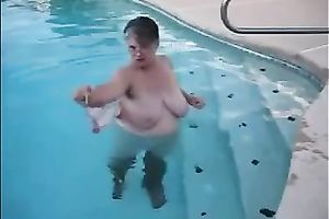 My elderly slutwife demonstrates her large love muffins in the pool