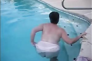 My elderly slutwife demonstrates her large love muffins in the pool
