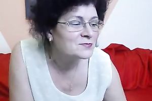 My old dirty slut wife undresses in front of a livecam and fingers her cookie