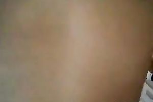 Slim brunette hair teen fingers her coochie in front of a web camera