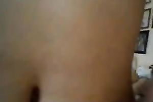 Slim brunette hair teen fingers her coochie in front of a web camera