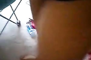 Slim brunette hair teen fingers her coochie in front of a web camera