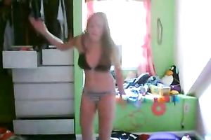 This hot legal age teenager is dancing seductively in front of the web camera
