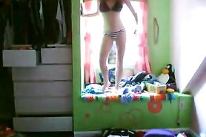This hot legal age teenager is dancing seductively in front of the web camera