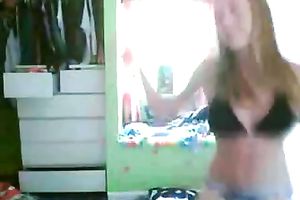 This hot legal age teenager is dancing seductively in front of the web camera