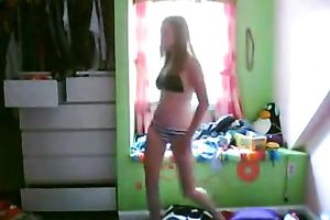 This hot legal age teenager is dancing seductively in front of the web camera