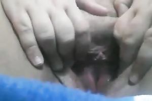 My perverted lover entertains herself by fingering her cunt