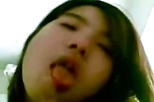 Having sex with a lewd Asian prostitute in the bedroom