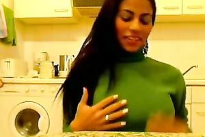 Gorgeous Hispanic doxy is showing off her large boobies