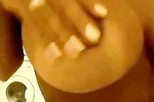 Gorgeous Hispanic doxy is showing off her large boobies