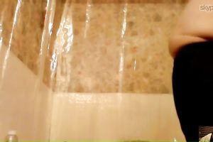 Chubby non-professional dark brown takes a shower in front of a cam