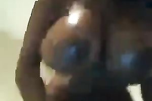 Outrageous couple of gigantic dark boobies on web camera