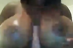 Outrageous couple of gigantic dark boobies on web camera