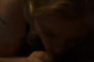 Watch a lewd golden-haired hussy working on my pierced dong
