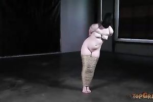 Chubby serf wench with pale skin is suspended to be tortured