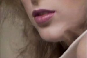 Blond bombshell with large tits is masturbating passionately