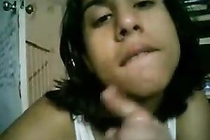 Petite Latina prostitute Carlita enjoys engulfing my soaked white penis