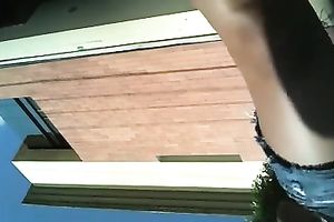 Another sexy mulatto playgirl gets caught on shoe camera in her short petticoat