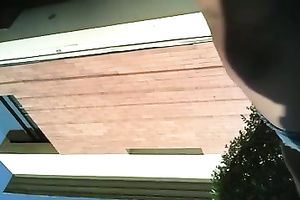 Another sexy mulatto playgirl gets caught on shoe camera in her short petticoat