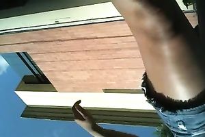 Another sexy mulatto playgirl gets caught on shoe camera in her short petticoat