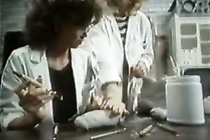 Kinky and sexy nurse abbes testing a large dildo by permeating their wet cracks