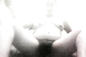 Fat wazoo doxy with saggy titties is rubbing her shaggy twat on webcam