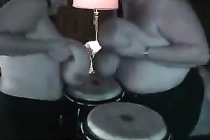 Chubby nymphos are playing drums with their large knockers