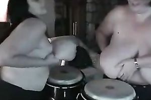 Chubby nymphos are playing drums with their large knockers