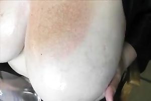 This trashy sweetheart is damn proud of her massive natural bazookas