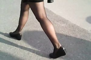 Classy honey in short miniskirt has no idea I am spying on her
