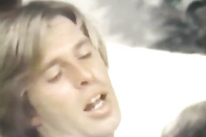 Juggy short-haired woman sucks a penis after enjoying sexy cunni