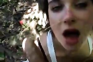Brunette legal age teenager pleases me with a deepthroat oral job outdoors