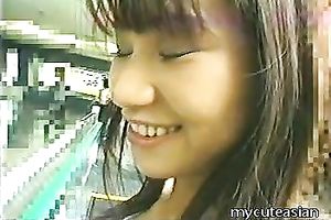 Shameless Japanese nympho receives on escalator and undresses exposed