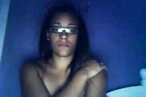 Frisky non-professional sweetheart likes playing with her bra buddies on a camera