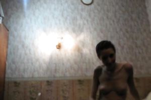 Slender brunette hair legal age teenager masturbates her muff in the bedroom