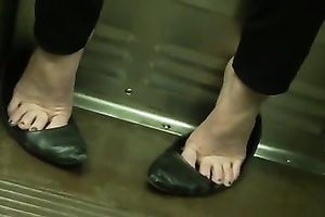 Amateur woman teases with her pleasant toes on a educate