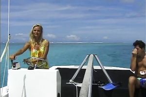 Blonde babe sucks a jock beneath water and receives drilled from behind