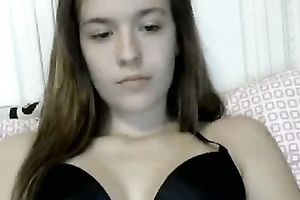 She doesn't look very enthusiastic about masturbating on webcam