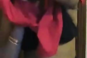 Homemade solo tape with Indian sweetheart stripping in front of a web camera
