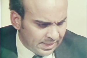 Cute playgirl in the kitchen receives on her knees to engulf a knob