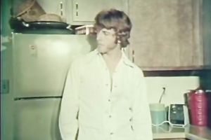 Cute playgirl in the kitchen receives on her knees to engulf a knob