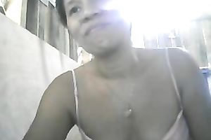 Mature cam Filipina wench plays with her diminutive milk cans