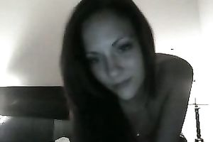 Dark-haired enchantress with pierced navel masturbates for me on cam
